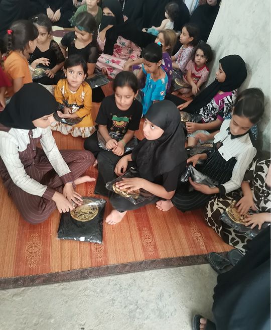 album – Distribution of children’s clothes – Baghdad – 2513