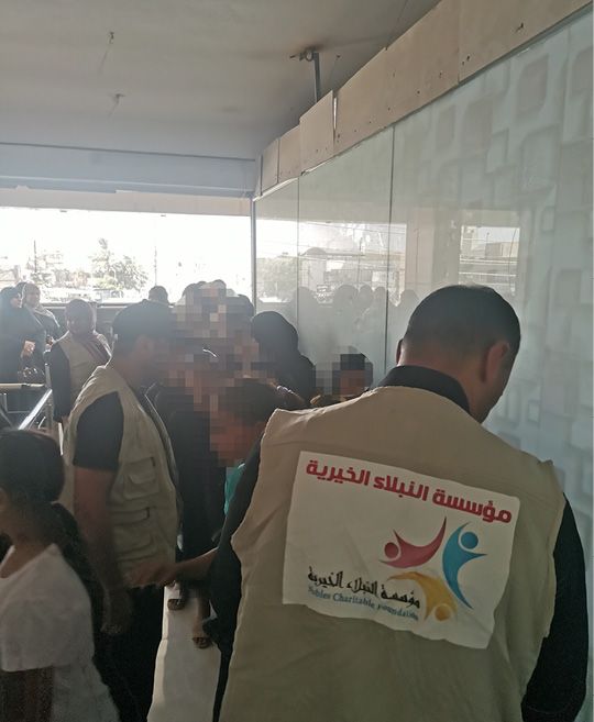 album – Distribution of children’s clothes – Baghdad – 25210