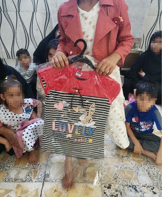 album – joy of Eid -Distribution of Eid clothing – Baghdad – 2484