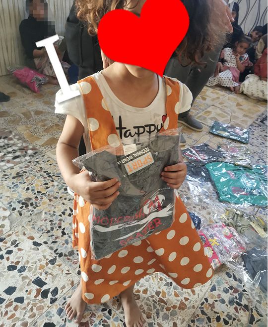 album – joy of Eid -Distribution of Eid clothing – Baghdad – 2487