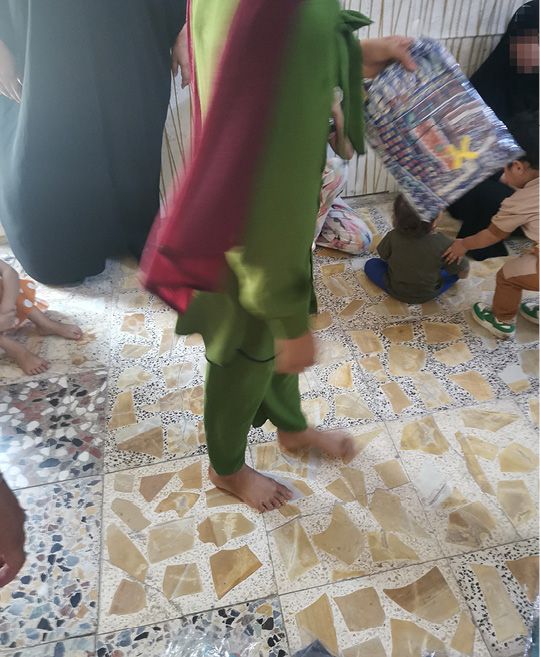 album – joy of Eid -Distribution of Eid clothing – Baghdad – 2489